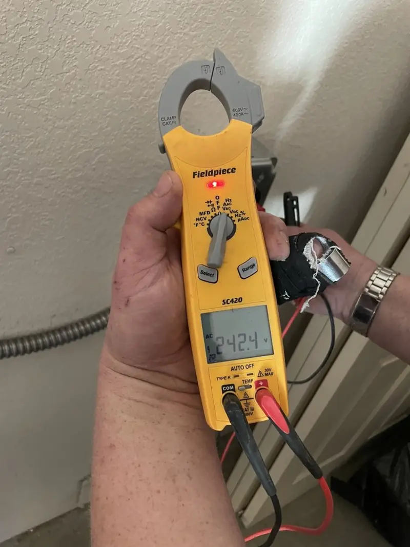 Voltage testing with clamp meter during Generator Installation in Royal Palm Beach